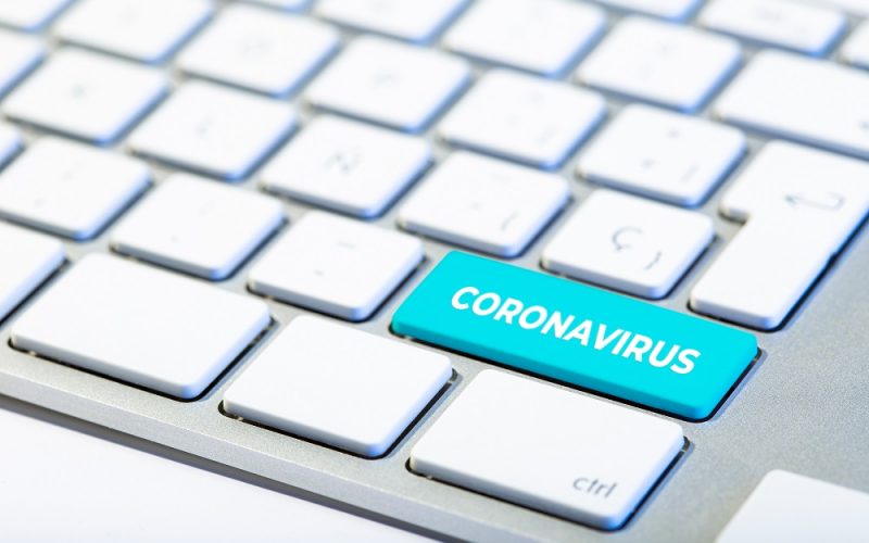 Keyboard with coronavirus on a key